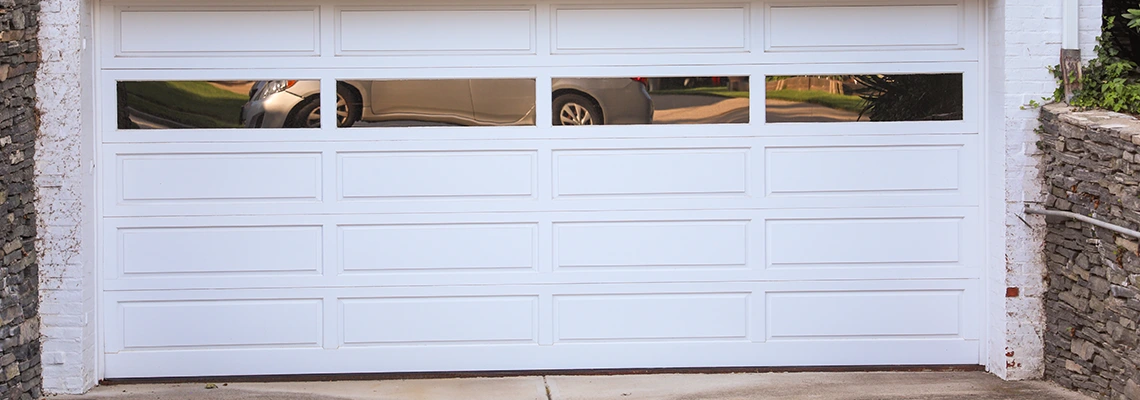 Wood Garage Door Bang Sound Repair in Saskatchewan